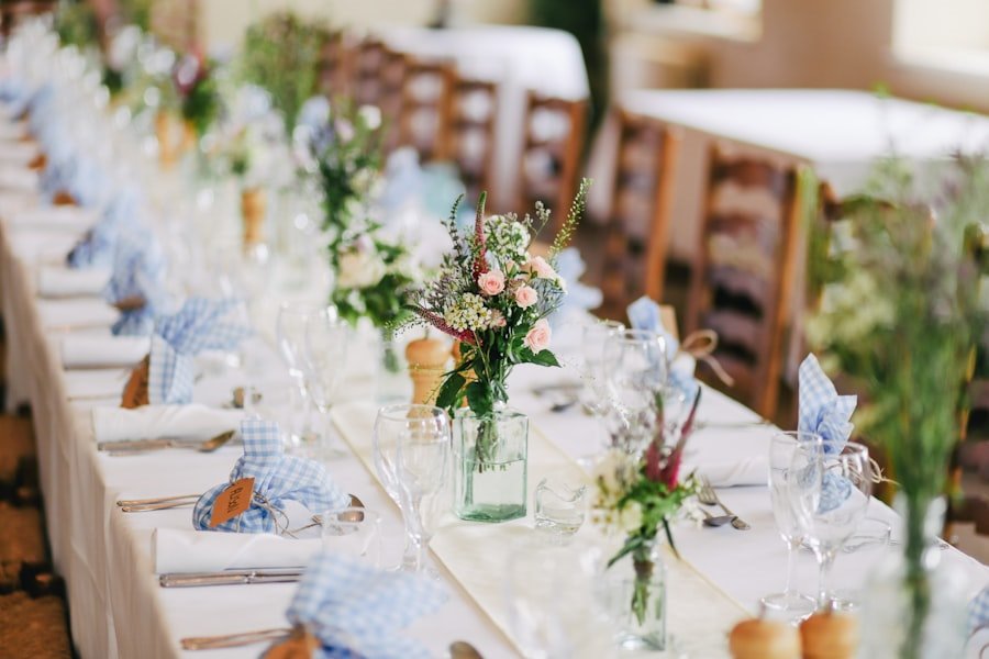 A long banquet table set for a catered Ember & Vine event